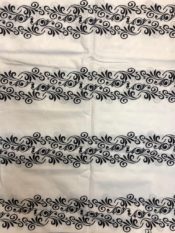 Seersucker african print fabric white with black floral strips