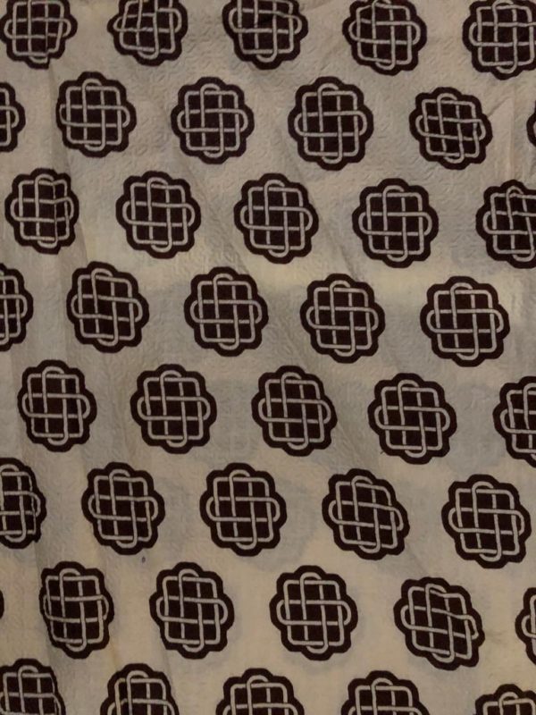 Seersucker african print fabric white with black honeycomb designs