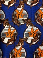 HI Target African Print fabric with a bright royal blue background and golden bird design pattern