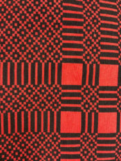 100% Cotton woven kente print fabric in red and black lines and squares