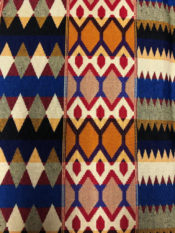 100% Cotton woven kente print fabric with a multi colored design