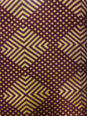 100% cotton woven kente print in burnt red and tan pattern