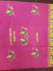 100% Cotton Introica George Nigerian uniform in bright pink with a leaf pattern border and center floral design