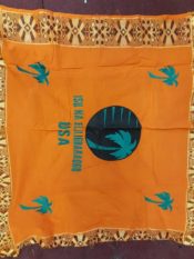 100% Cotton Introica George Nigerian uniform in bright orange with a embroidered pattern border and center teal palm tree design